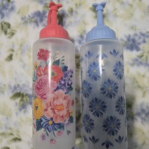 Floral Water Bottles with Red and Blue Caps
